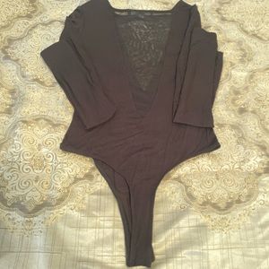 Brand new body suit never worn